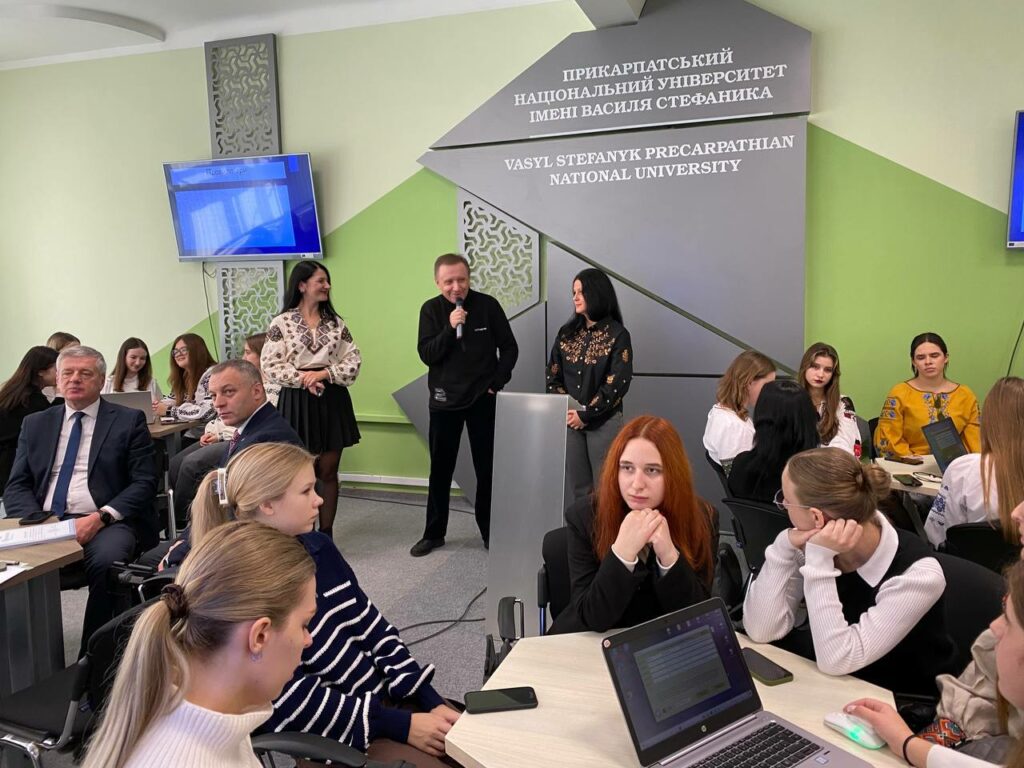 A group of people standing in a room